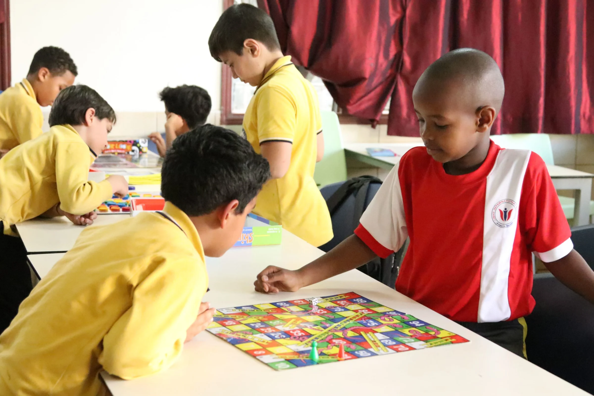 Learners playing board and mind games