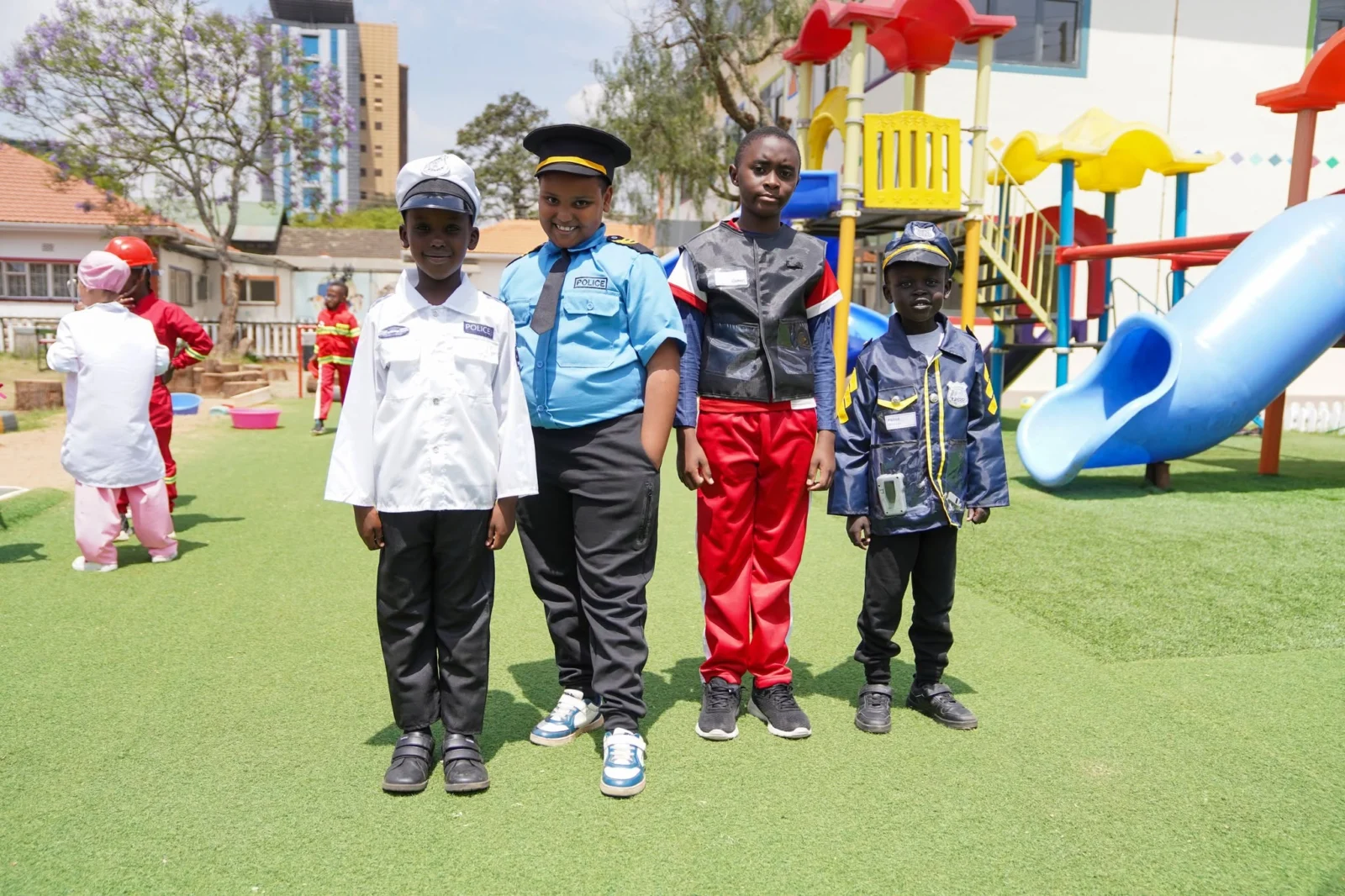 Learners dressed as police officers and safety officers